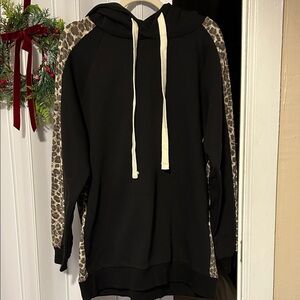 Zenana Outfitters Black Hoodie with Leopard Print Sleeves